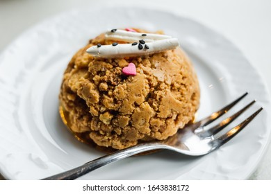 Traditional Russian Soviet Cake Muraveynik Or Funnel Cake On A White Plate, A Dessert Fork