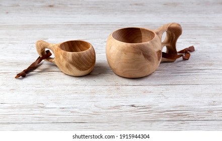 Traditional Sami Wooden Cups On A Wooden Table. Kuksa. Finnish Wooden Cups. Finnish Culture.