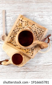 Traditional Sami Wooden Cups With Tea On A Wooden Table, On Wooden Planks Stands. Kuksa. Finnish Wooden Cups. Finnish Culture. View From Above.