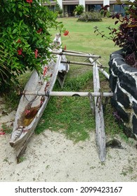 A Traditional Samoan Canoe On A Beach                               