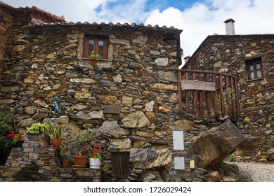 Traditional schist house architecture (Aldeias do Xisto) of houses in the rural village of Pena, Serra da Lousa, Portugal - Shutterstock ID 1726029424