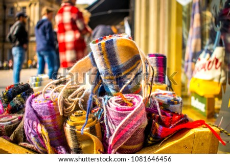 traditional Scottish wool linen tartan rolls on the streets of Edinburgh 