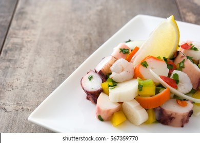 Traditional Seafood Ceviche From Peru On Wooden Background
