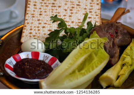 Traditional sedder table set for a Jewish Festive meal on Passover (transliterated as Pesach or Pesah), also called chag HaMatzot - Festival of Matzot is a Jewish holiday 