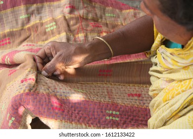 Traditional Sewing Of Quilts By A Female In Bangladesh