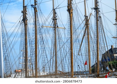 Traditional ship masts and rigging creating dense nautical patterns
