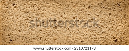 Traditional Sliced Bread Texture Background Top View. Pattern of Homemade Brown Organic Cereal Bread Made of Sourdough Dough