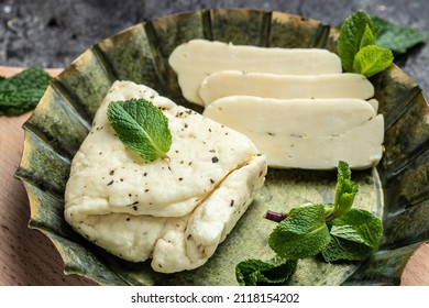 Traditional Slices Of Cyprus Halloumi Cheese With Mint. Healthy Eco Food. Food Recipe Background. Close Up.