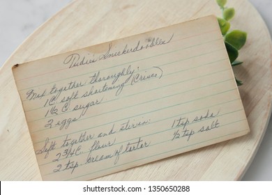 Traditional Snickerdoodle Cookie Recipe On Wood Board And White Marble Surface