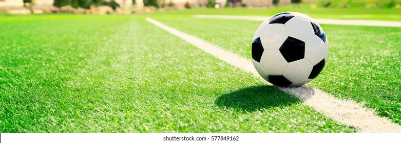 Traditional Soccer Ball On Soccer Field 