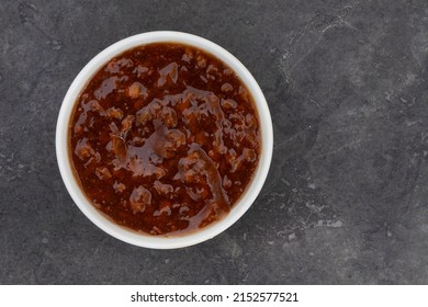 Traditional South African Fruit Chutney, A Popular Condiment In A White Bowl With Copy Space