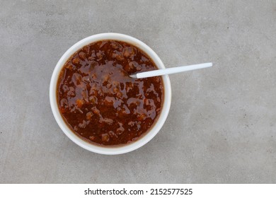 Traditional South African Fruit Chutney, A Popular Condiment In A White Bowl With Copy Space