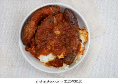 Traditional South African Pap And Wors, Maize Meal With Sausage And Chakalaka Sauce