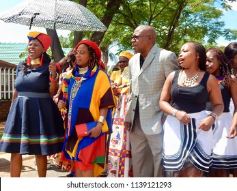 Traditional South African Wedding Between, Xhosa And Ndebele - Johannesburg, South Africa, 29 October 2017. Bride Being Followed By Uncle And Singers