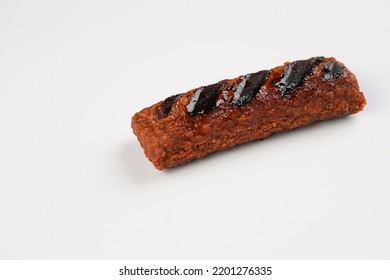 Traditional South European Skinless Sausages Cevapcici Made Of Ground Meat And Spices, Vegan Substitute Made Of Soy Protein, One On White Background