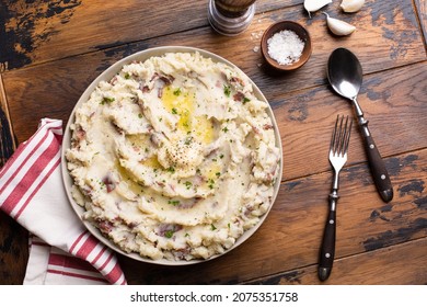 Traditional southern garlic mashed potatoes made with red potatoes skin on