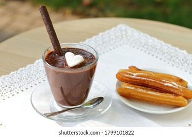 Traditional Spanish Dessert, Churros And Hot Chocolate With Marshmallow Heart Shaped