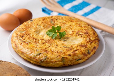 Traditional Spanish omelette with potatoes and zuuchini - Shutterstock ID 1932201941