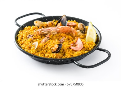 Traditional spanish seafood paella, isolated on white background

