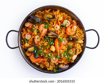 Traditional Spanish Seafood Paella With Rice, Mussels, Shrimps In A Pan On White Background. View From Above, Flat Lay