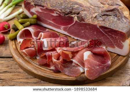 traditional speck on chopping board