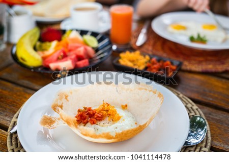 Traditional Sri Lankan breakfast with egg hoppers
