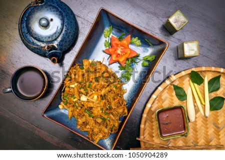 Traditional Sri Lankan kottu roti in wooden background