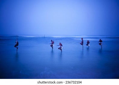 Traditional Stilt Fishermen In Sri Lanka.