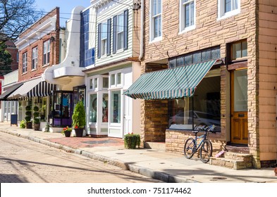 Traditional Stores Along A Cobblestone Street In Downtown Annapolis, MD