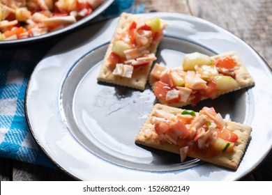 Traditional Surimi Crab Ceviche With Cucumber And Tomato On Wooden Background