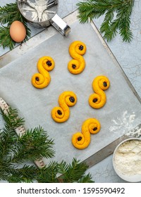 Traditional Swedish Christmas Food. Saffron Buns On A Baking Sheet Before Baking. Top View, Flat Lay.