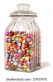 traditional sweet jar full of smarties on a white background