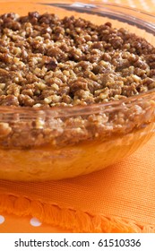Traditional sweet potato casserole topped with chopped walnuts and plenty of brown sugar. A wonderful side dish for a Thanksgiving or Christmas holiday dinner.