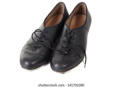 Traditional Tap dancing shoes on a white background and floor