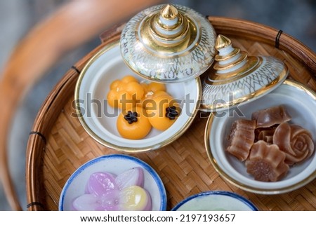 
Traditional Thai desserts on ancient bowls