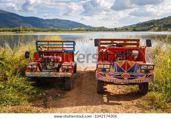 Traditional Thai farming trucks in countryside\
of Thailand