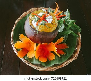 Traditional Thai Food Steamed Fish Curry Paste In The Jar With Vegetables As A Side Dish.