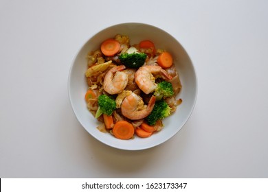 Traditional Thai Street Food Seafood Pad See Ew Top View. Thai Stir Fried Noodles With Vegetables Isolated On White Background. Phat Si Io.