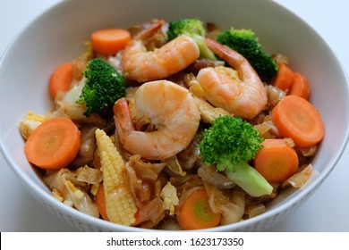 Traditional Thai Street Food Seafood Pad See Ew Top View. Thai Stir Fried Noodles With Vegetables Isolated On White Background. Phat Si Io.