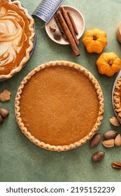 Traditional Thanksgiving Pumpkin Pie With Flaky Crust Overhead View