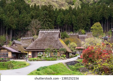 Traditional thatched roof houses in small village of Miyama in the mountains north of Kyoto - Shutterstock ID 1385252156