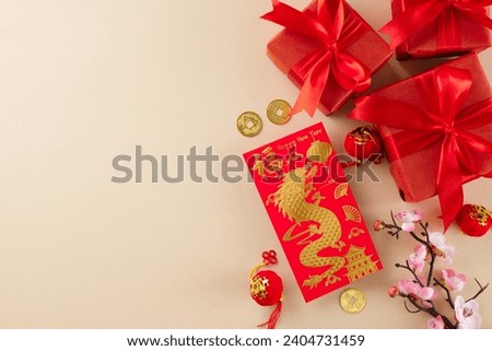 Traditional tokens of goodwill for Chinese New Year. Top view photo of New Year money red packet, present boxes, sakura bloom, gold coins on beige background with advert space