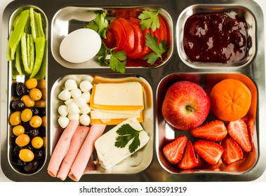 Traditional Turkish Breakfast With Salami, Cheese, Pepper, Jam, Egg, Tomato, Olives And Fruits In A Metal Food Tray Table D'hote,Tabldot Background