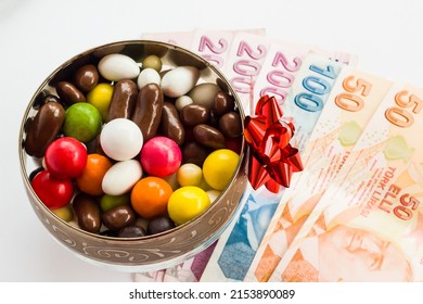 Traditional Turkish Colorful Candies On White Surface With Turkish Money, Conceptual Image Of Holiday Bonus