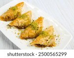 Traditional turkish dessert baklava with cashew, walnuts. Homemade baklava with nuts and honey.