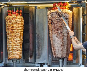 Traditional turkish foods, chicken doner and meat doner kebap in Istanbul, Turkey. Doner kebab (also döner kebab) is a type of kebab, made of meat cooked on a vertical rotisserie. 