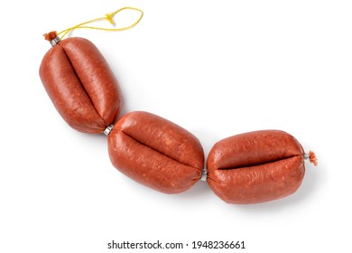 Traditional Turkish halal sucuk, a dry, spicy and fermented sausage isolated on white background