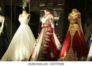 Traditional turkish wedding dresses on mannequins. Turkish bridal dresses in the shop.
