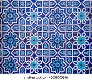traditional Uzbek pattern on the ceramic tile on the wall of the mosque, background