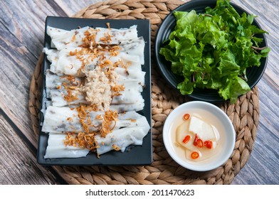 Traditional Vietnamese dish - Banh Cuon, Vietnamese steam rice rolls with fish sauce and vegetables